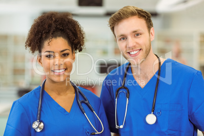 Young medical students smiling at camera