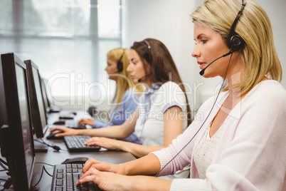 Call centre agents talking on the headset