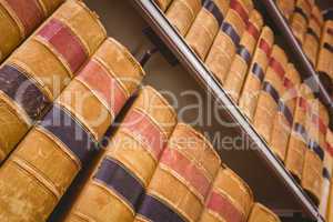 Close up of shelf with old books