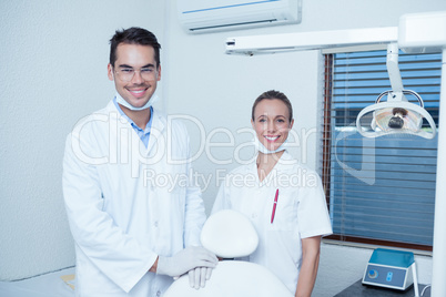 Portrait of smiling dentists