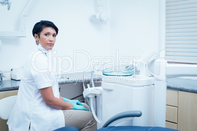 Side view of female dentist