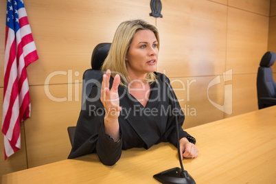 Stern judge speaking to the court