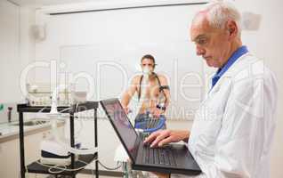 Man doing fitness test on exercise bike