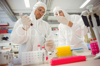 Science students working in protective suits