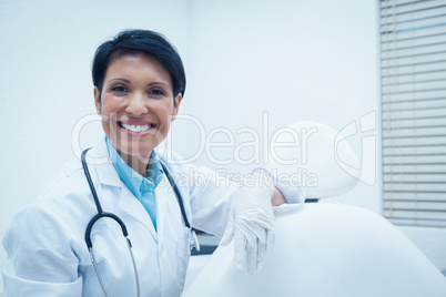 Portrait of smiling female dentist