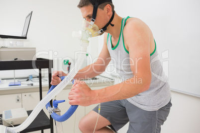 Man doing fitness test on exercise bike