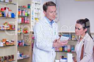 Pharmacist explaining the drug to patient