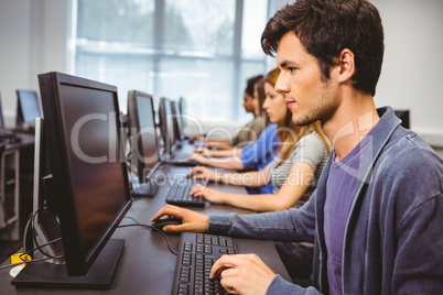 Focused student in computer class