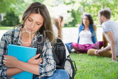 Lonely student feeling excluded on campus