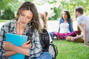 Lonely student feeling excluded on campus