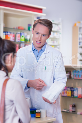 Pharmacist and sick customer speaking