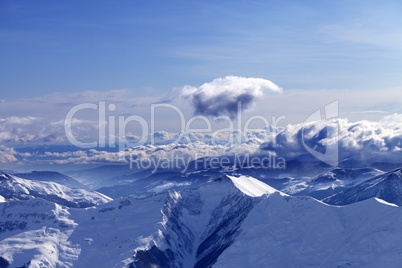 Winter mountains at nice evening and sunlight clouds