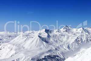 Snow mountains and blue clear sky