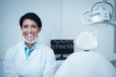 Smiling young female dentist