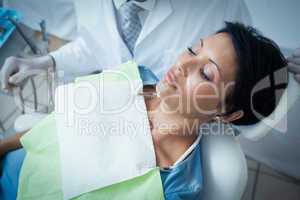 Close up of woman having her teeth examined