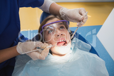 Young patient wearing safety glasses during the examination