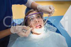 Young patient wearing safety glasses during the examination