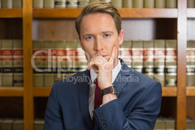 Lawyer frowning in the law library