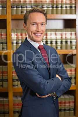 Lawyer smiling in the law library