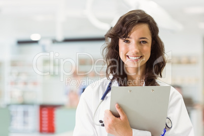 Pretty medical student smiling at camera