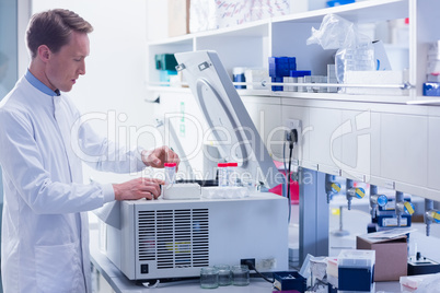 Focused chemist doing an experiment