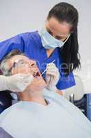 Dentist wearing surgical mask