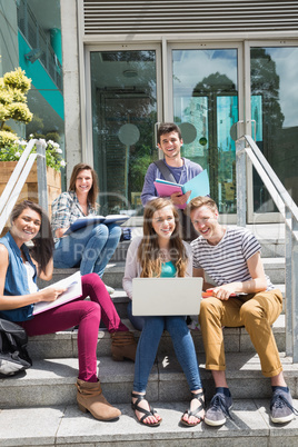 Students sitting on steps studying