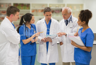 Medical professor talking with students