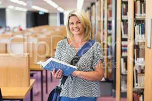 Mature student studying in the library