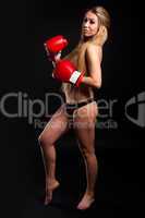 beautiful nude girl with boxing gloves