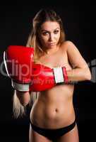 beautiful nude girl with boxing gloves