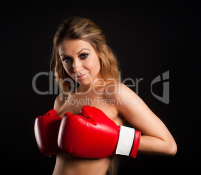 beautiful nude girl with boxing gloves