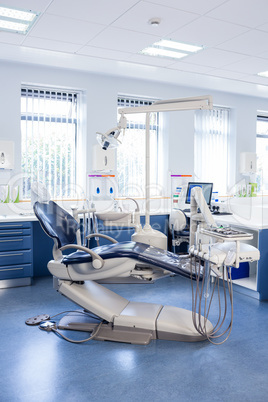 Inside of the clinic with dentists chairs, computer and tools