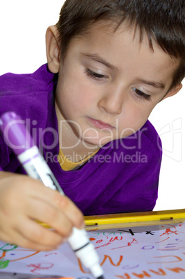 Young boy write