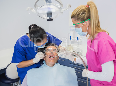 Dentist examining a patient