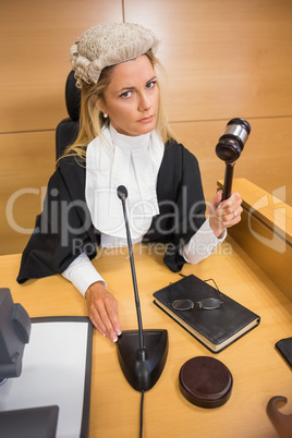 Stern judge banging her hammer