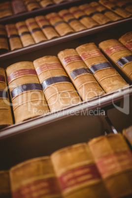 Close up of shelf with old books