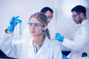 Science student holding up test tube