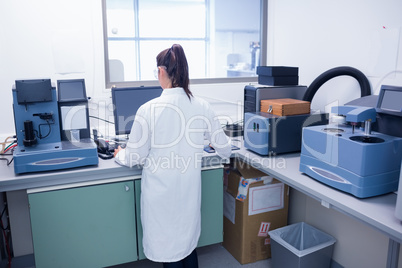 Young scientist conducting an experiment