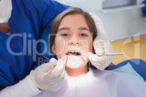 Scared young patient in dental examination