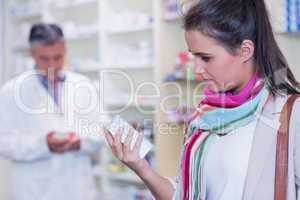 Customer holding a drug box