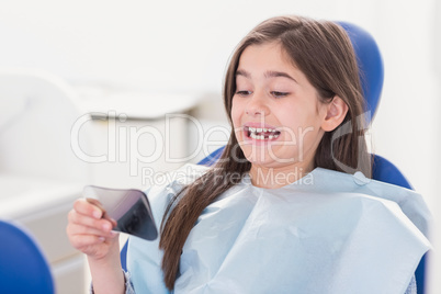 Young patient looking in the mirror