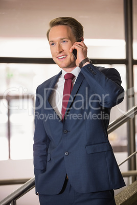 Handsome businessman on the phone