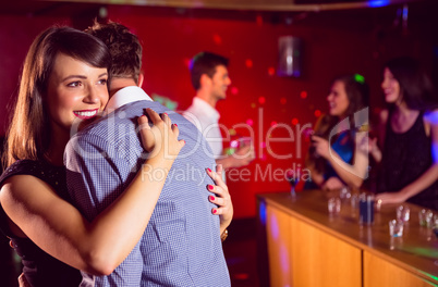 Cute couple slow dancing together