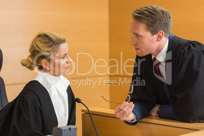 Lawyer speaking with the judge