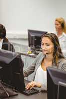 Call centre agents talking on the headset