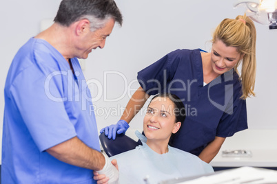 Dentist and nurse introducing a patient