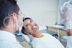 Smiling woman waiting for dental exam