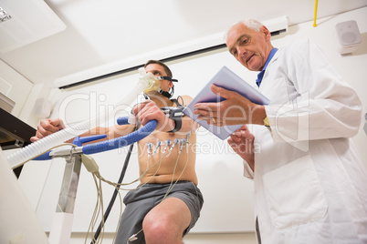 Man doing fitness test on exercise bike