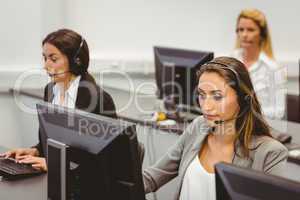 Call centre agents talking on the headset